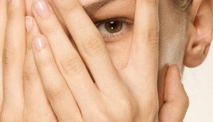 147683471-hands-cover-face-eye-peek-628X363